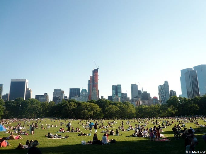People relaxing in sheep meadow, Central Park