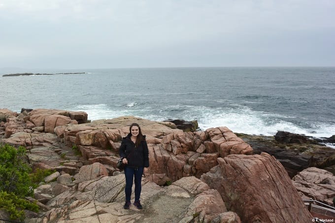 Standing at the edge of Maine's red granite coast